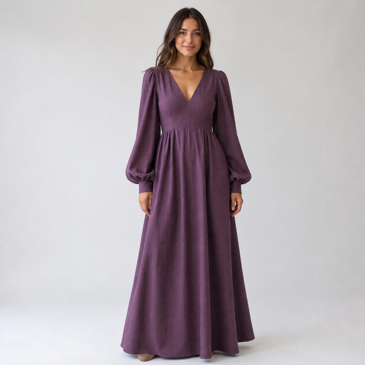 Elegantes Maxikleid mit tiefem V-Ausschnitt und Bischofsärmeln